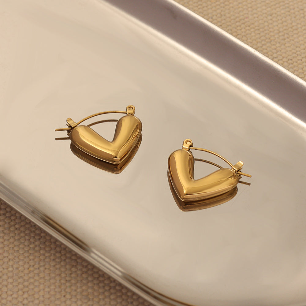 Handle: puffed-heart-huggies-gold-20mm