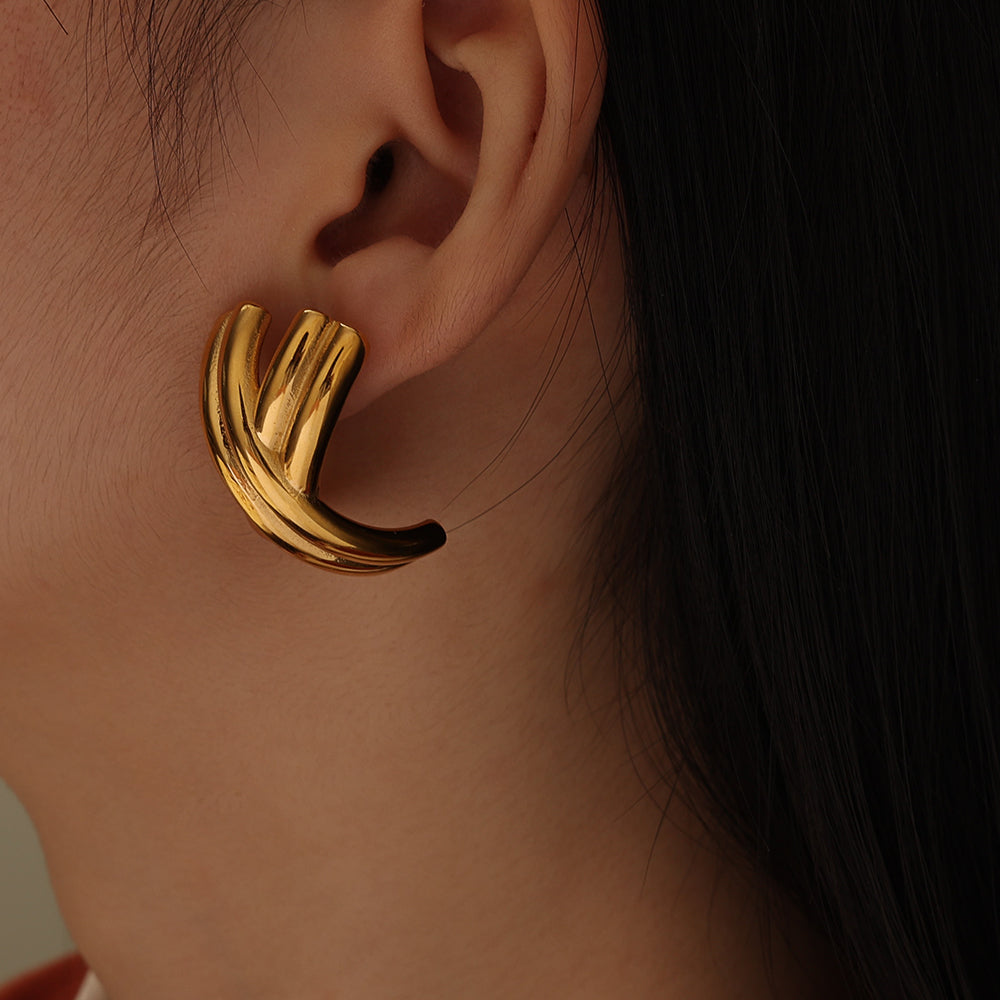 Twisted X Earrings – Gold (20 × 32.7 mm)