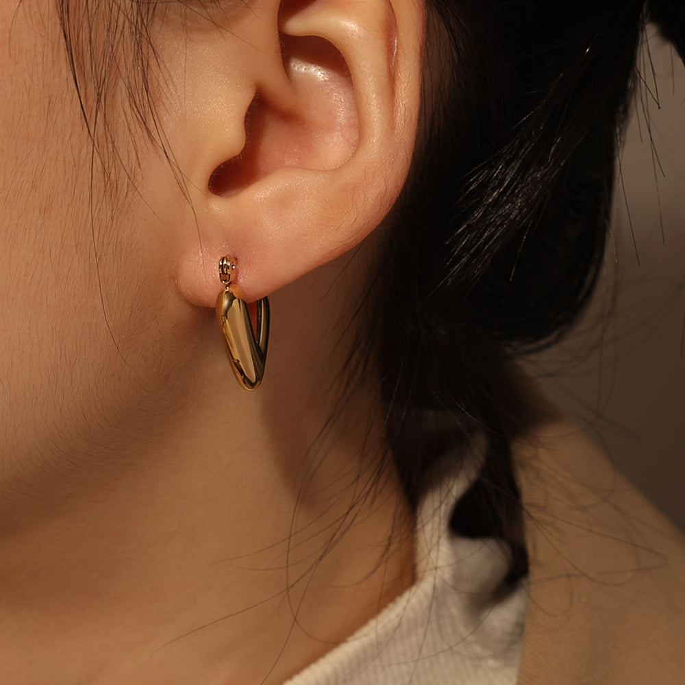 Handle: puffed-heart-huggies-gold-20mm