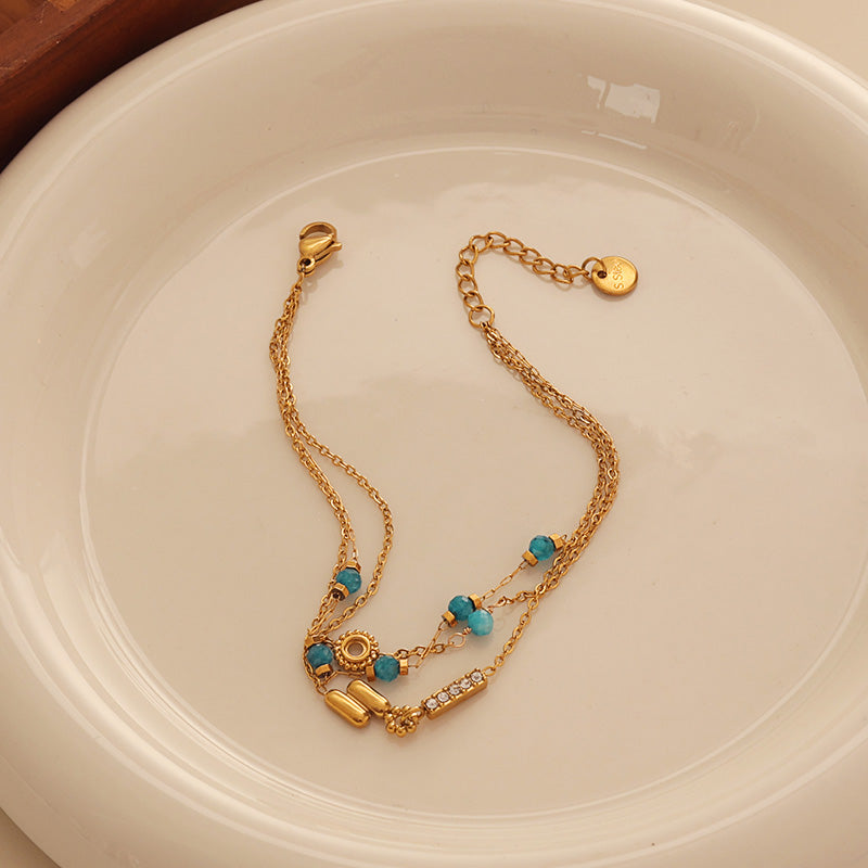 Aqua Bead Charm Bracelet – Gold