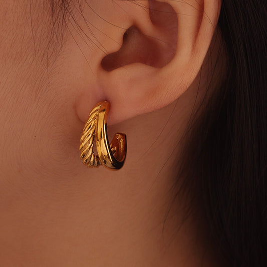 Twist Huggie Hoops – Gold