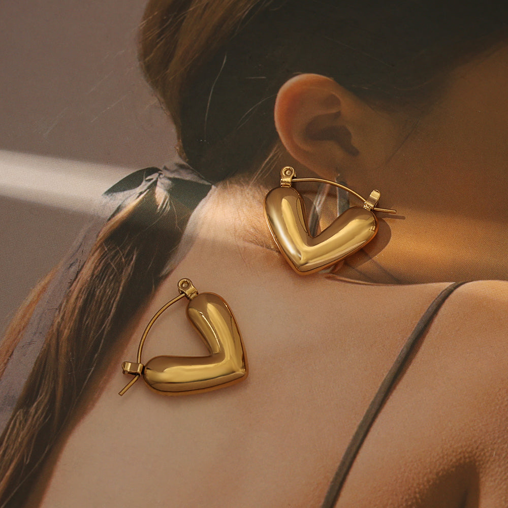 Handle: puffed-heart-huggies-gold-20mm