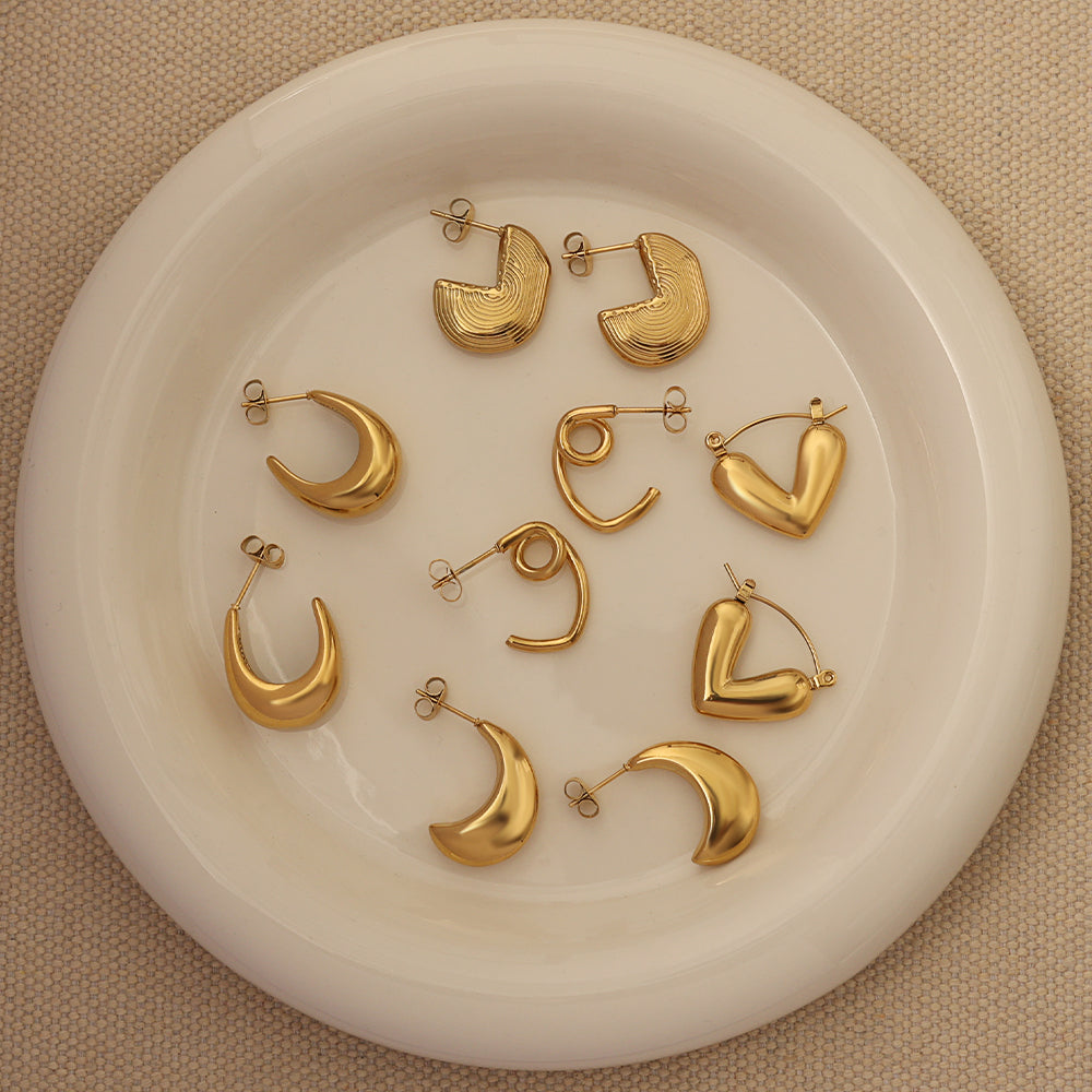 Handle: puffed-heart-huggies-gold-20mm